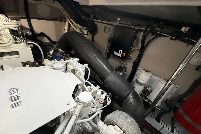 Seas The Day Yacht Photos Pics Engine room of 2014 Sea Ray 580 Sundancer with visible components and piping.