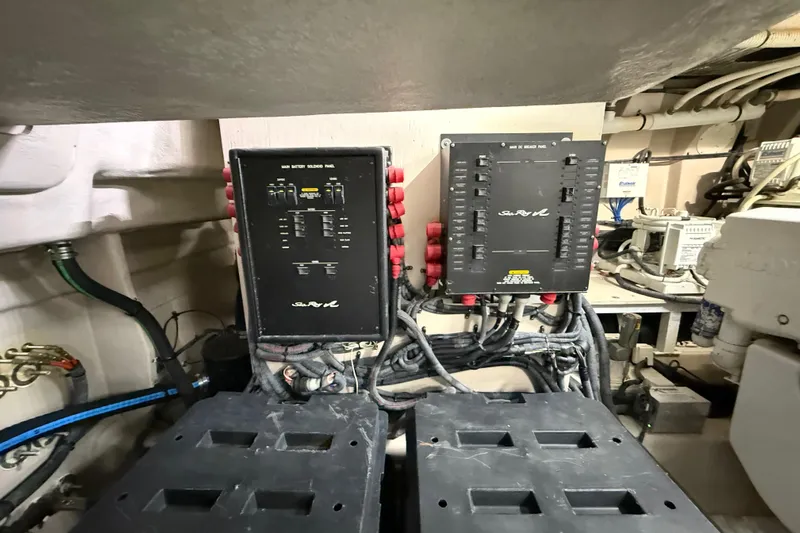 Seas The Day Yacht Photos Pics Engine room of 2014 Sea Ray 580 Sundancer with electrical panels and wiring.