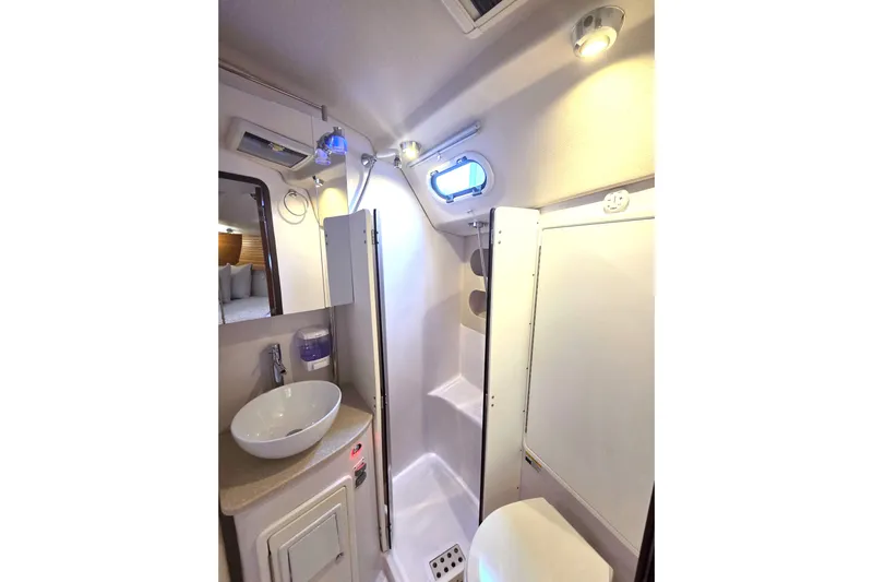 Here & Now Yacht Photos Pics 2021 Catalina 445 yacht bathroom with modern fixtures and compact design.