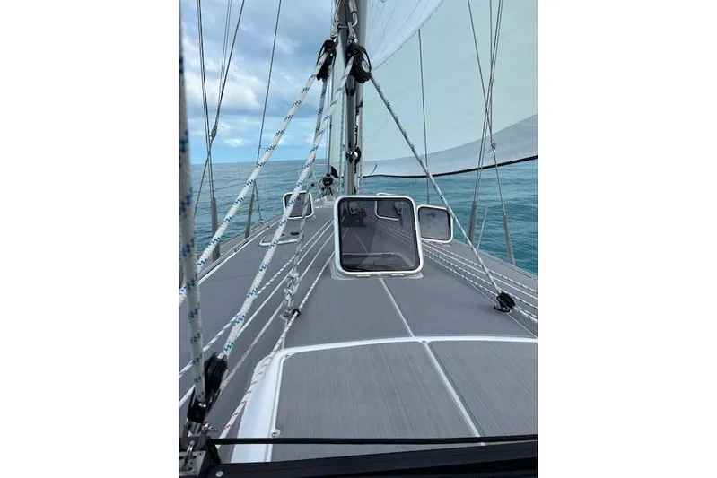 Here & Now Yacht Photos Pics Sailing on a 2021 Catalina 445 yacht, view of the deck and ocean.