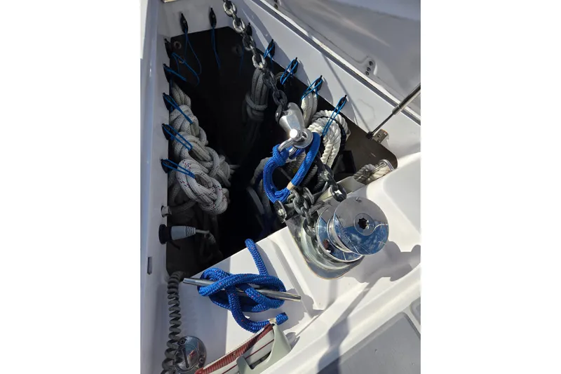 Here & Now Yacht Photos Pics Anchor locker of 2021 Catalina 445 sailboat with ropes and chains.