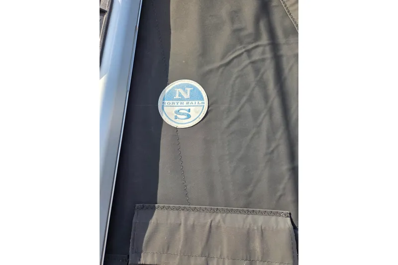 Here & Now Yacht Photos Pics North Sails logo on black fabric, Catalina 445, 2021 model.