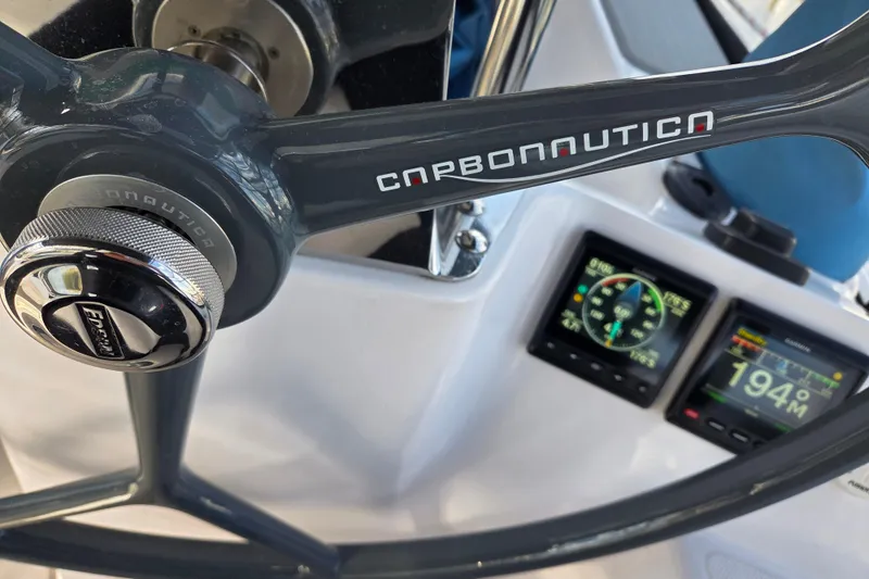 Here & Now Yacht Photos Pics Steering wheel of 2021 Catalina 445 yacht with digital navigation displays.