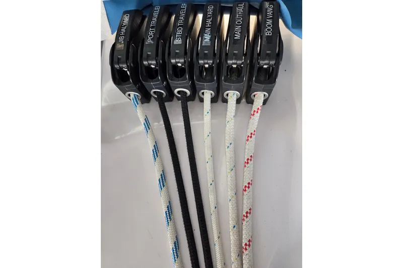 Here & Now Yacht Photos Pics Sailing rigging lines on a 2021 Catalina 445 yacht, labeled for easy identification.