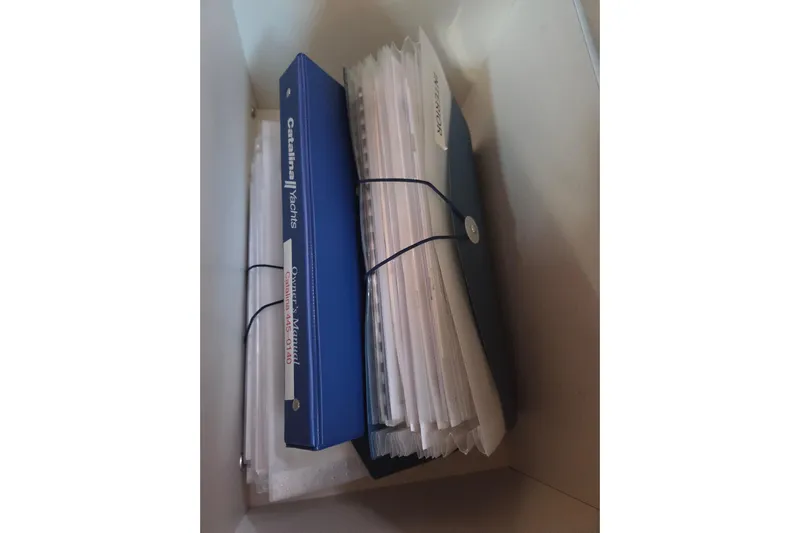 Here & Now Yacht Photos Pics Blue Catalina Yachts manual binder and documents in a box, model 445, year 2021.