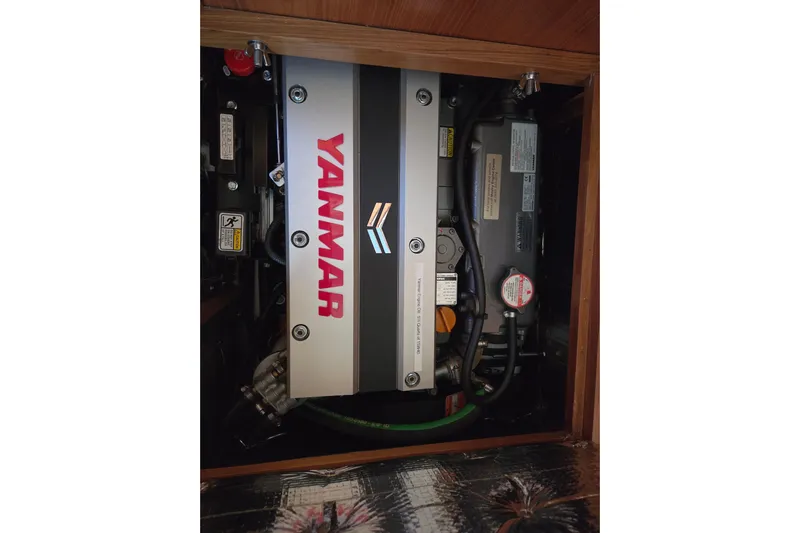 Here & Now Yacht Photos Pics Engine compartment of a 2021 Catalina 445 sailboat featuring a Yanmar engine.