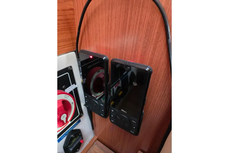Here & Now Yacht Photos Pics Control panel and devices on a 2021 Catalina 445 yacht interior.