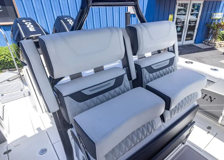  Yacht Photos Pics 2023 Blackfin 272 CC boat seating with luxurious gray upholstery and modern design.