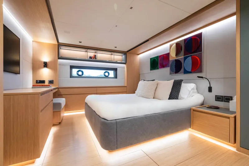 Simon Yacht Photos Pics Luxurious 2024 Pardo Yachts GT75 bedroom with modern decor and ambient lighting.