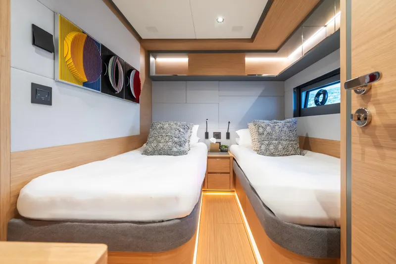 Simon Yacht Photos Pics Luxurious 2024 Pardo Yachts GT75 cabin with twin beds and modern decor.