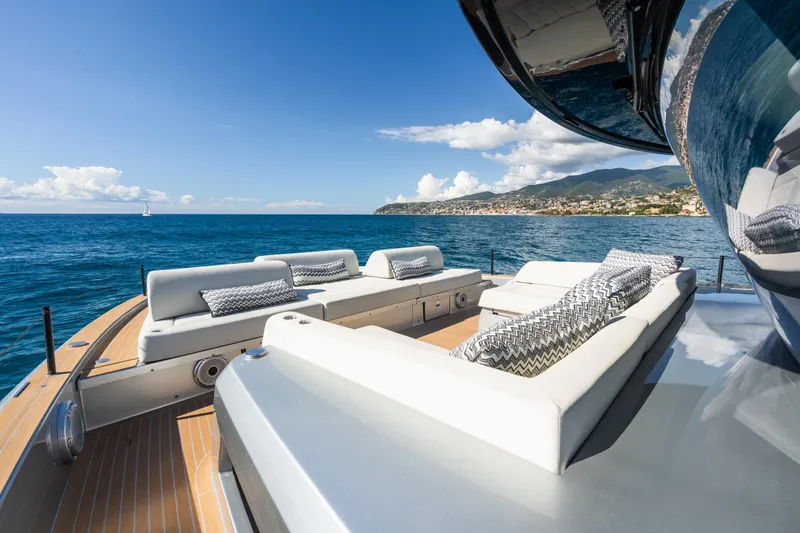 Simon Yacht Photos Pics Luxurious 2024 Pardo Yachts GT75 with elegant deck seating and stunning ocean view.