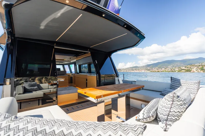 Simon Yacht Photos Pics Luxurious 2024 Pardo Yachts GT75 with elegant interior and scenic ocean view.