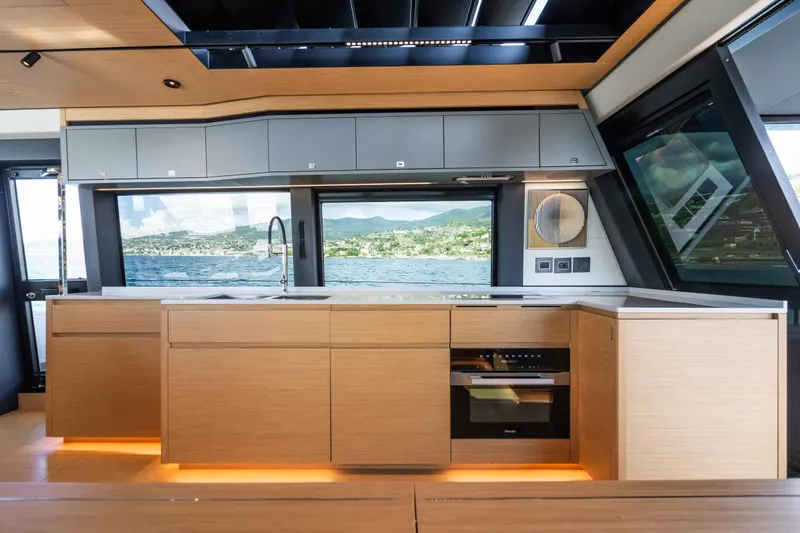 Simon Yacht Photos Pics Luxurious 2024 Pardo Yachts GT75 kitchen with modern design and scenic ocean view.