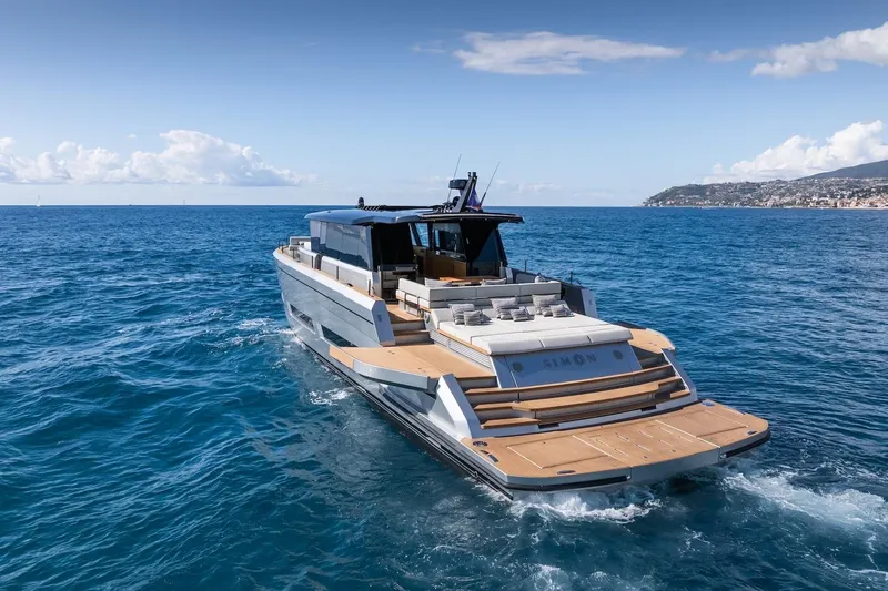 Simon Yacht Photos Pics 2024 Pardo Yachts GT75 cruising on open sea under clear blue sky.
