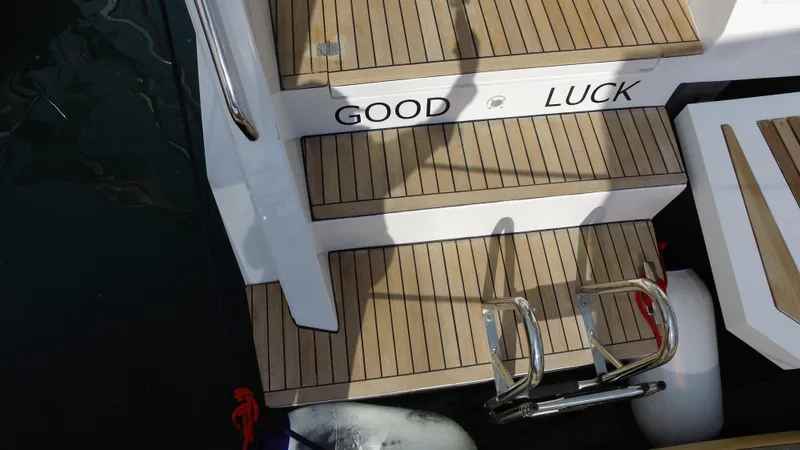 Tbd Yacht Photos Pics Steps on Aventura 45 yacht, 2025 model, with "Good Luck" text.