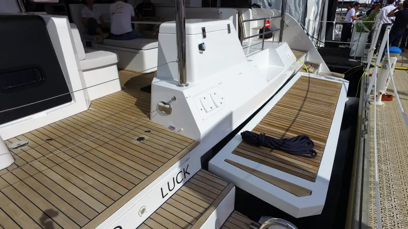 Tbd Yacht Photos Pics Aventura 45 yacht deck, 2025 model, featuring sleek design and wooden flooring.