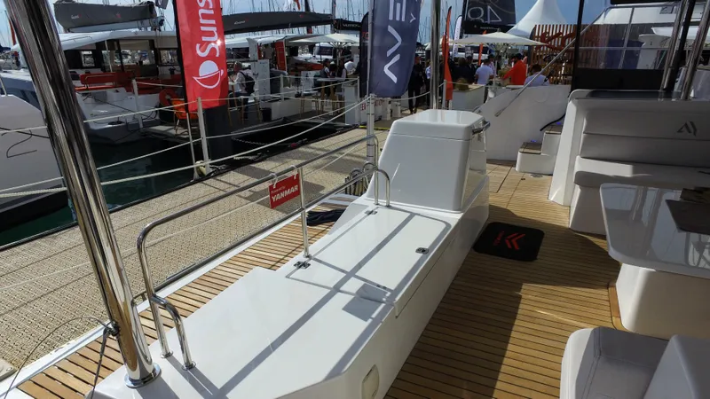 Tbd Yacht Photos Pics Aventura 45 yacht deck, 2025 model, featuring sleek design and modern amenities at a boat show.