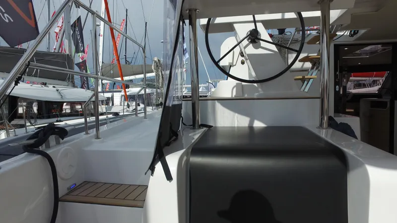 Tbd Yacht Photos Pics Aventura 45 yacht cockpit with steering wheel, modern design, 2025 model, docked at marina.