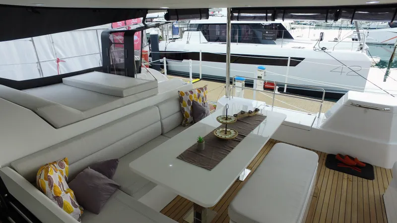 Tbd Yacht Photos Pics Luxurious Aventura 45 yacht interior with elegant seating and dining area, 2025 model.