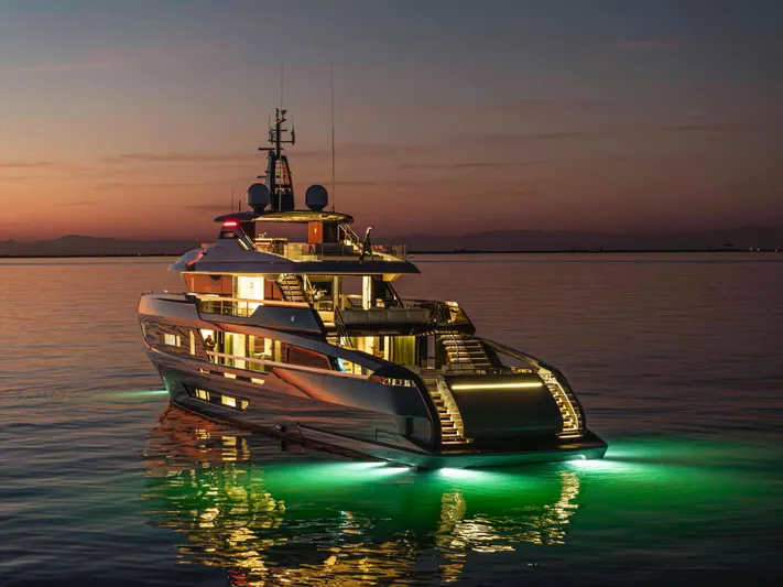 Doge 400 Yacht Photos Pics Luxurious Ocean King Doge 400 yacht, 2027 model, illuminated at sunset on calm waters.