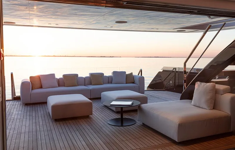 Doge 400 Yacht Photos Pics Luxurious Ocean King Doge 400 yacht deck with modern seating, overlooking serene sunset waters, 2027 model.
