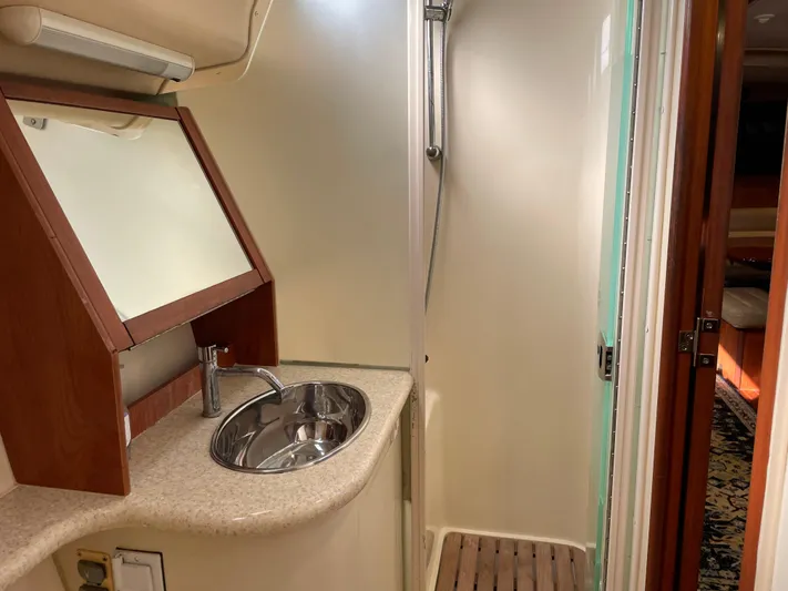 Sailing Diver Yacht Photos Pics Bathroom interior of 2010 Hunter 49 Aft Cockpit yacht with sink and shower.