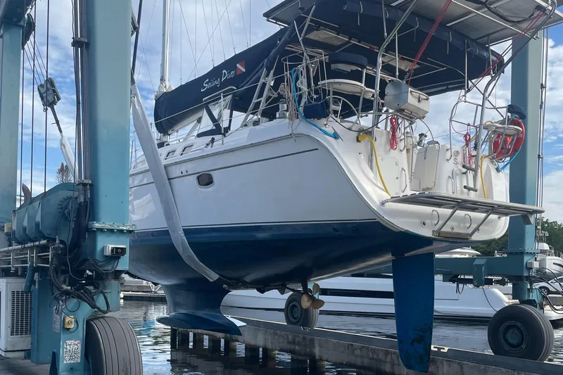 Sailing Diver Yacht Photos Pics 2010 Hunter 49 Aft Cockpit sailboat in dry dock for maintenance.