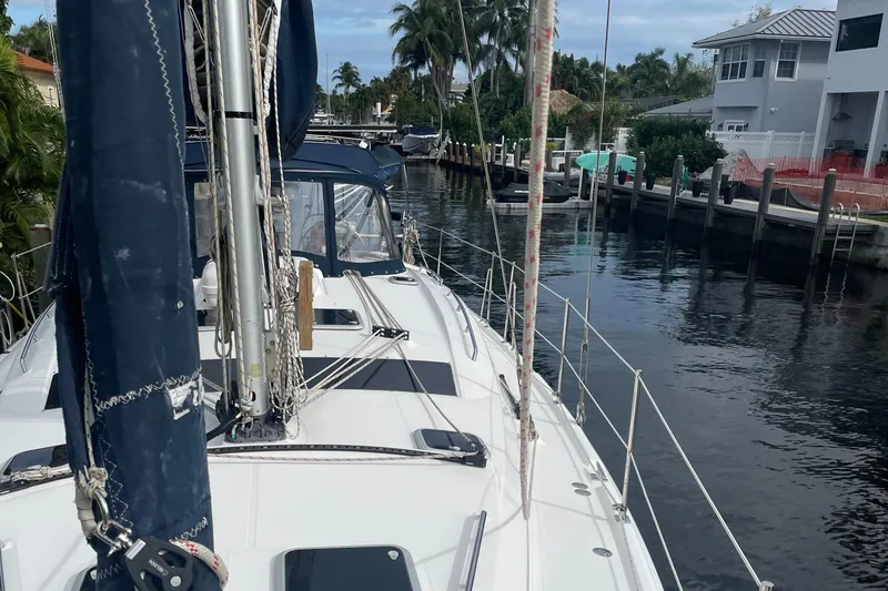 Sailing Diver Yacht Photos Pics Sailboat docked in a canal, Hunter 49 Aft Cockpit, 2010 model.