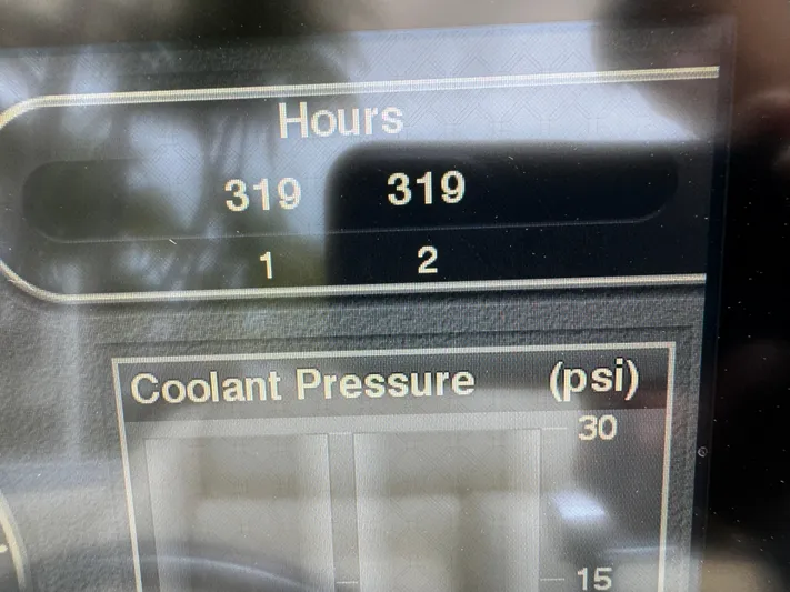  Yacht Photos Pics Dashboard display showing 319 hours and coolant pressure for 2013 Nor-Tech 420 Monte Carlo.