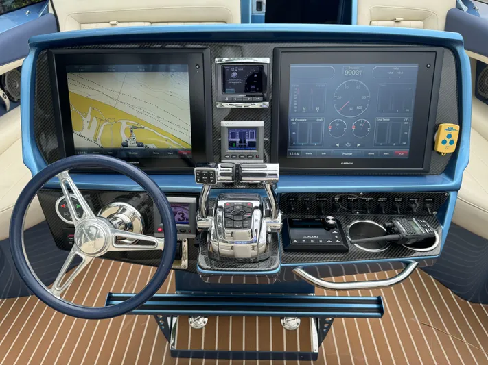  Yacht Photos Pics Dashboard of 2013 Nor-Tech 420 Monte Carlo with advanced navigation and control systems.