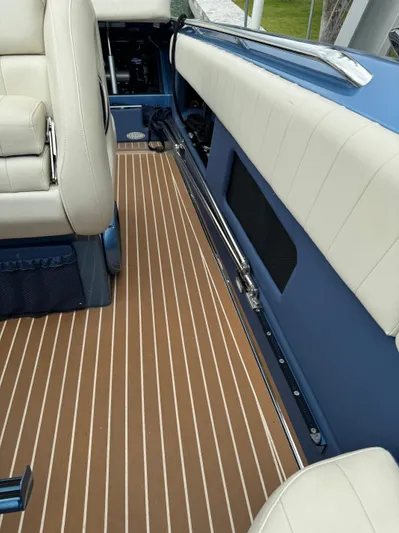  Yacht Photos Pics 2013 Nor-Tech 420 Monte Carlo interior with beige seating and striped flooring.