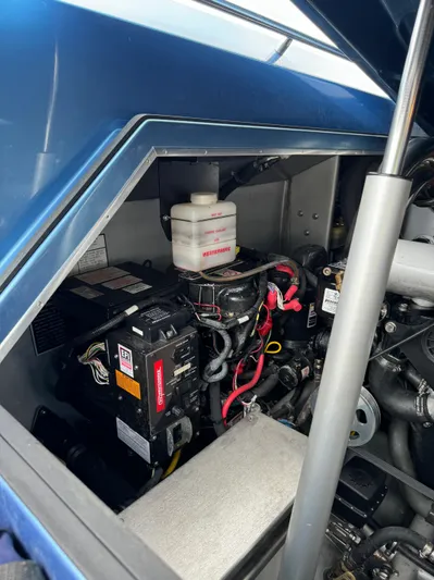  Yacht Photos Pics Engine compartment of a 2013 Nor-Tech 420 Monte Carlo boat, showcasing mechanical components.