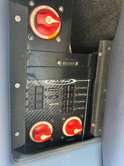  Yacht Photos Pics Control panel of 2013 Nor-Tech 420 Monte Carlo boat with switches and dials.