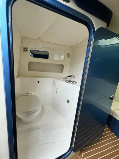  Yacht Photos Pics 2013 Nor-Tech 420 Monte Carlo bathroom with modern fixtures and sleek design.