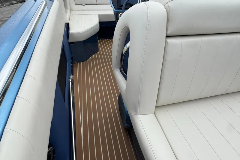  Yacht Photos Pics 2013 Nor-Tech 420 Monte Carlo interior with white seating and wood-patterned flooring.