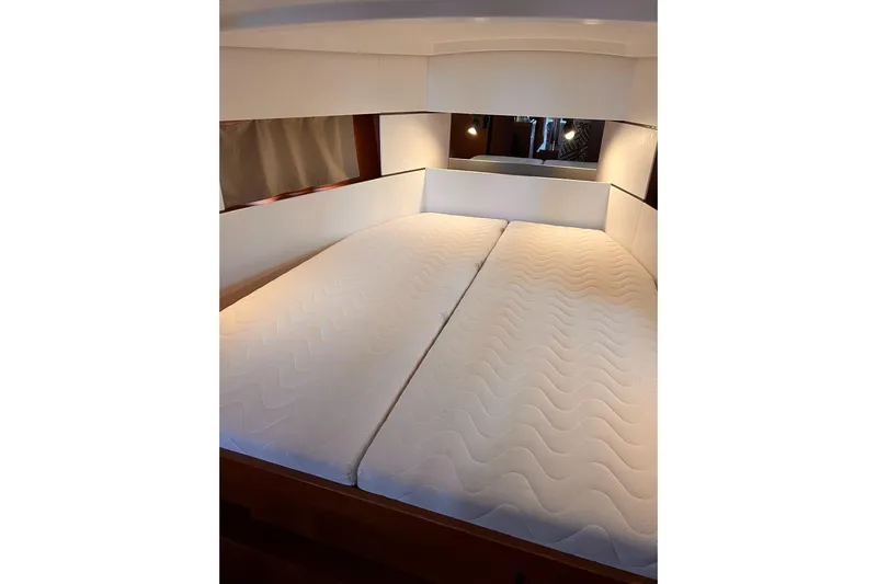 Grey Havens Yacht Photos Pics Interior cabin of 2017 Beneteau Oceanis 38.1 yacht with comfortable bedding.