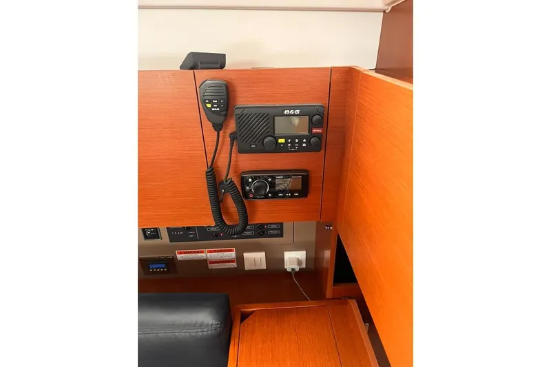 Grey Havens Yacht Photos Pics Control panel of 2017 Beneteau Oceanis 38.1 yacht with communication equipment.