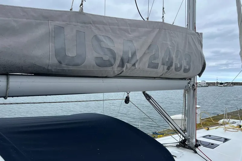 Grey Havens Yacht Photos Pics 2017 Beneteau Oceanis 38.1 sailboat with USA 2403 sail cover, docked at marina.