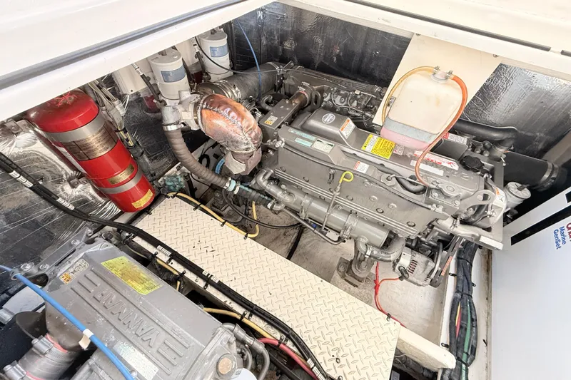 Ursula Yacht Photos Pics Engine compartment of 2006 Cruisers Yachts 370 Express, featuring detailed mechanical components.