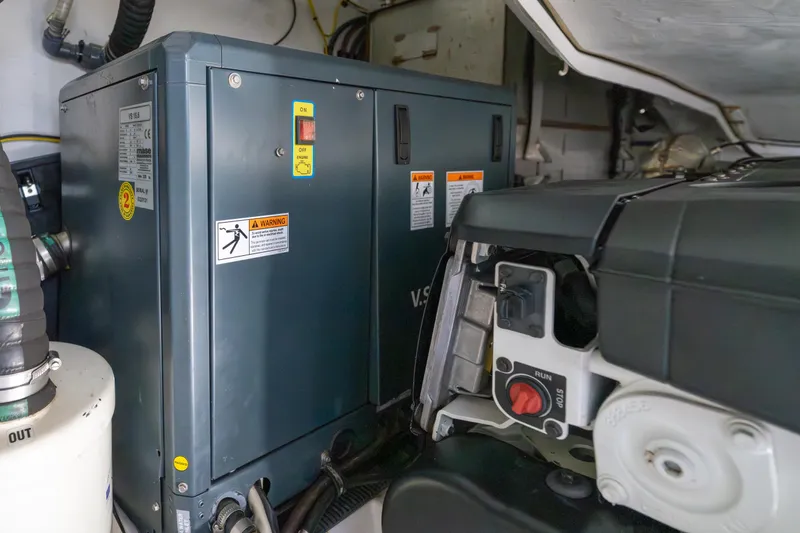  Yacht Photos Pics Engine room of 2023 Azimut Atlantis 45 yacht, featuring machinery and control panels.