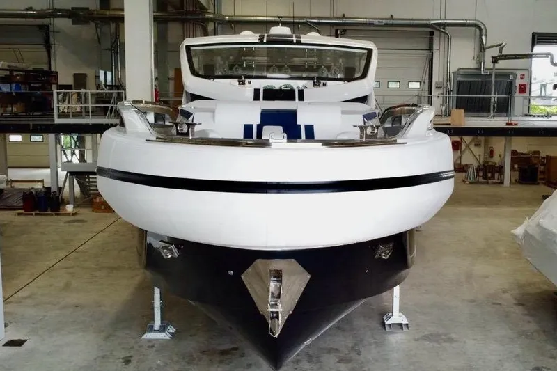  Yacht Photos Pics 2025 SACS Rebel 55 yacht in a workshop, front view.