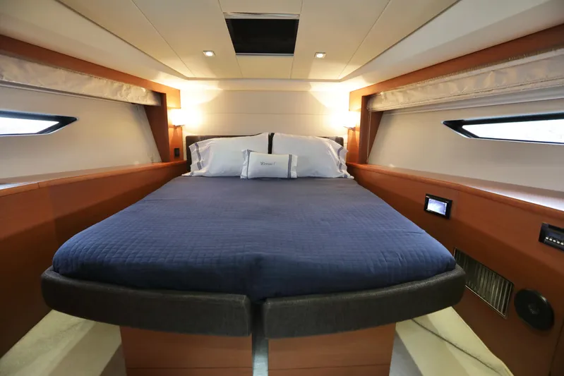 Perseus Yacht Photos Pics Luxurious bedroom in a 2013 Prestige 500 yacht with modern design.