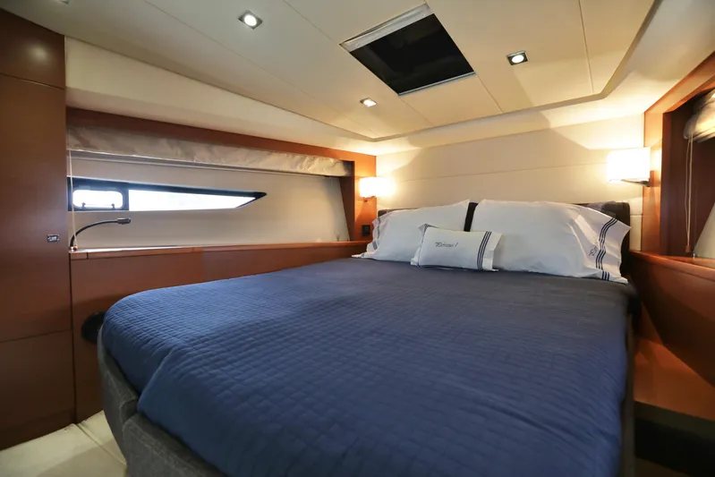 Perseus Yacht Photos Pics Luxurious bedroom in 2013 Prestige 500 yacht with modern lighting and cozy bedding.