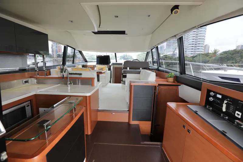 Perseus Yacht Photos Pics Interior of a 2013 Prestige 500 yacht with modern kitchen and seating area.