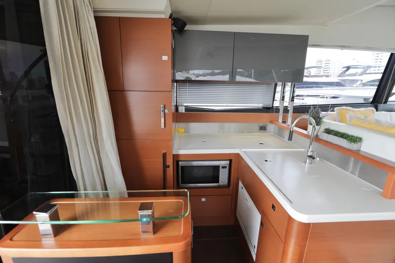 Perseus Yacht Photos Pics Modern kitchen in 2013 Prestige 500 yacht with sleek cabinetry and appliances.