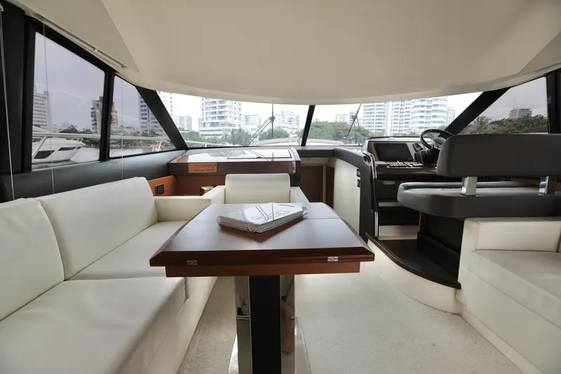 Perseus Yacht Photos Pics Interior of 2013 Prestige 500 yacht with modern seating and navigation area.