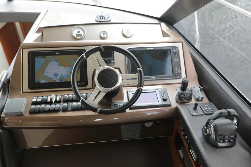Perseus Yacht Photos Pics Prestige 500 yacht helm station with navigation screens and controls, 2013 model.