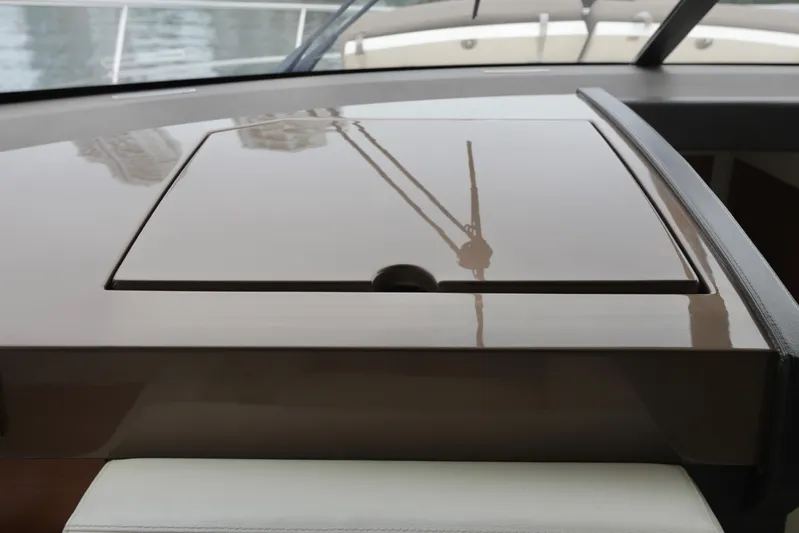 Perseus Yacht Photos Pics Dashboard of a 2013 Prestige 500 yacht with a closed compartment.