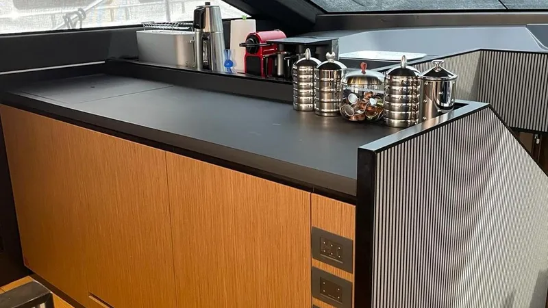  Yacht Photos Pics Luxurious interior of 2023 Ferretti Yachts 720 with modern kitchen amenities.