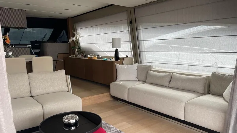  Yacht Photos Pics Luxurious interior of 2023 Ferretti Yachts 720, featuring elegant seating and modern decor.